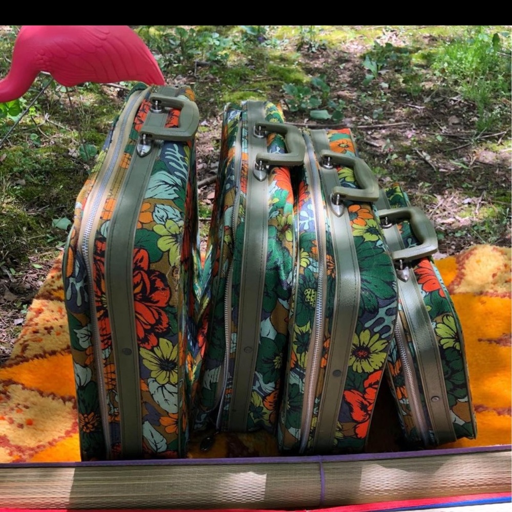 set of 4 vintage 70s suitcases